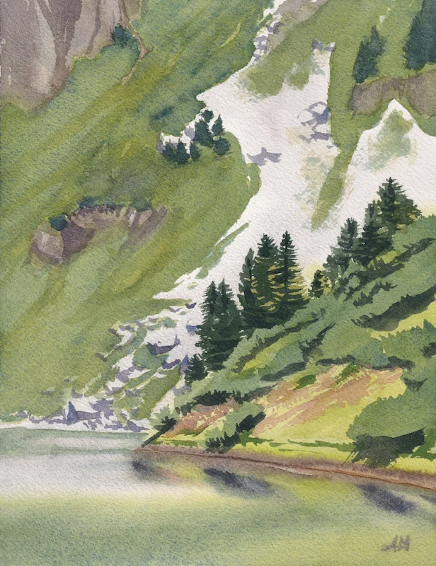 Le lac de Lessy en été par temps nuageux, la lumière est douce, l'eau a des reflets pastels
