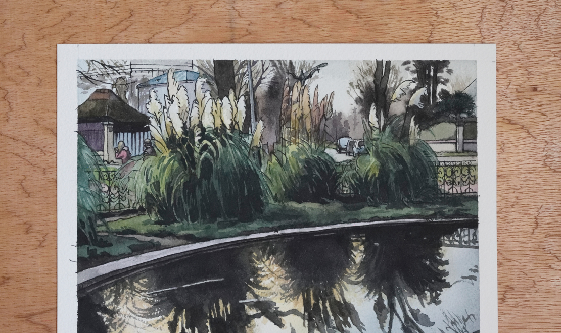 Photo de l'oeuvre "bassin du parc en novembre". Aquarelle paysagère représentant un jardin en hiver, un bassin avec des reflets d'arbres dans l'eau. Vue d'un détail.