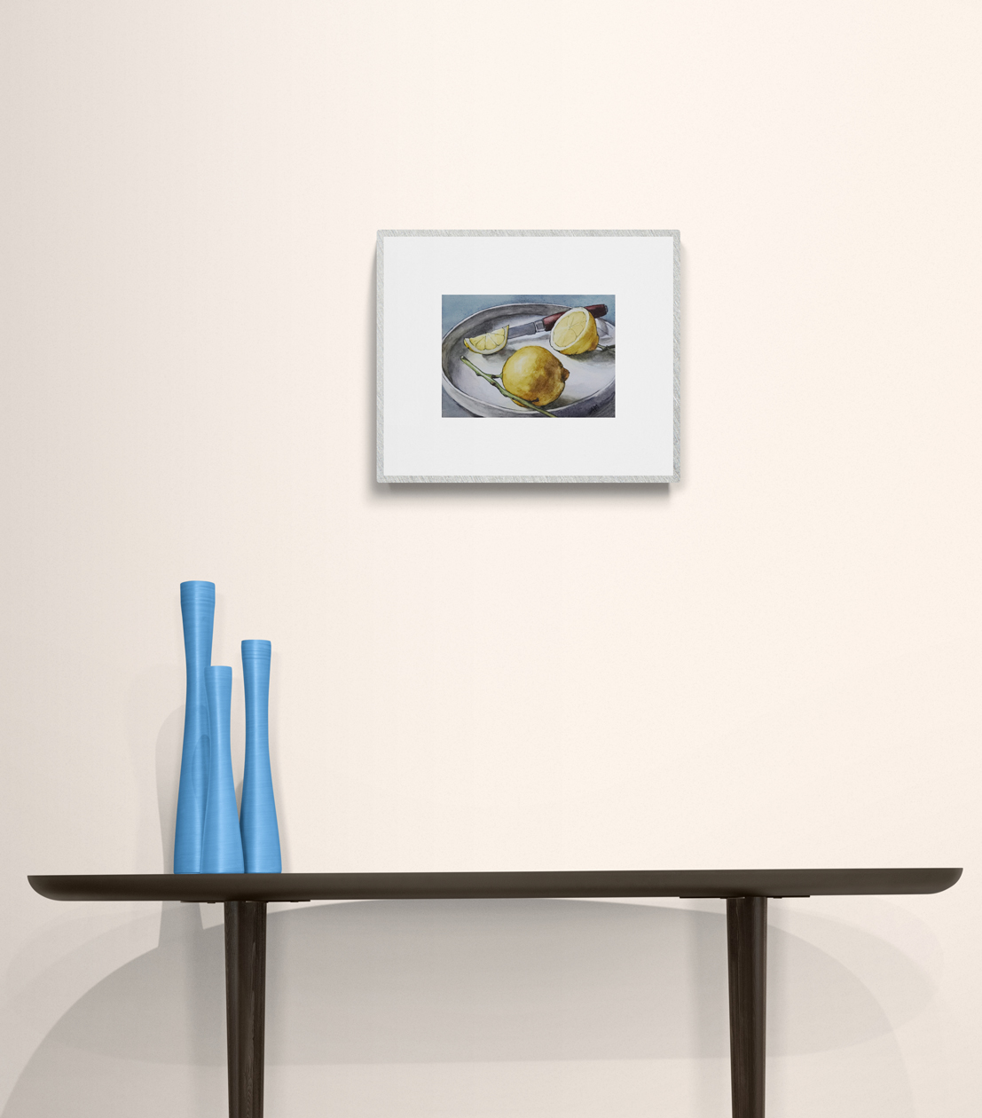 Photo de l'oeuvre "citrons" dans un exemple d'encadrement et mise en situation dans un intérieur.