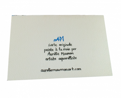 Verso d'une carte de vœux au format paysage. Le texte dit "carte originale peinte à la main par Aurélie Maumon artiste aquarelliste aureliemaumonart.com". Le texte a été écrit à la main à la plume et à l'encre de Chine.