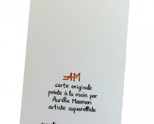 Verso d'une carte de vœux au format vertical. Le texte dit "carte originale peinte à la main par Aurélie Maumon artiste aquarelliste aureliemaumonart.com". Le texte a été écrit à la main à la plume et à l'encre de Chine.